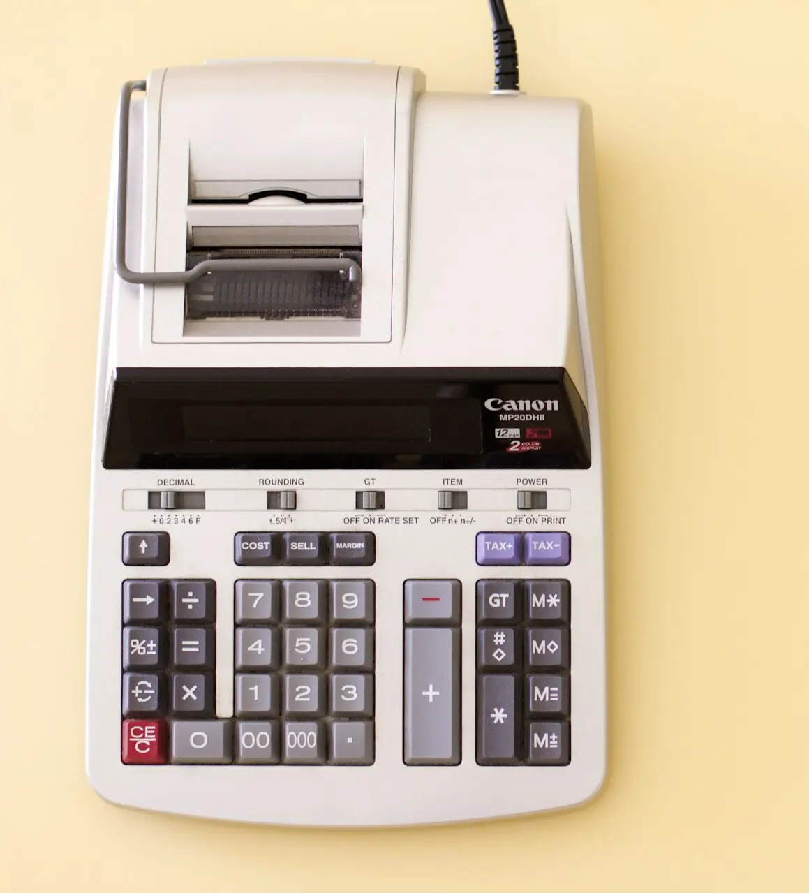 white Canon cash register
